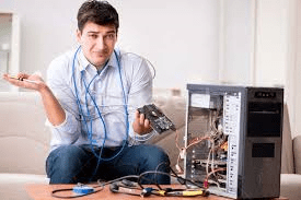 man with broken computer